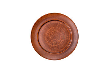 An empty round ceramic plate on a table, kitchenware. An empty plate