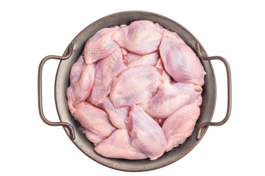 Fresh raw quail breasts (skin-on) arranged in a round metal pan, isolated on a white background. Ready for cooking.
