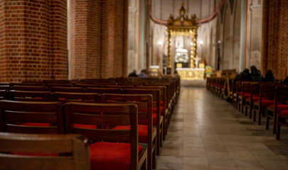 Naklejka premium View Of Rows Of Chairs In Catholic Cathedral