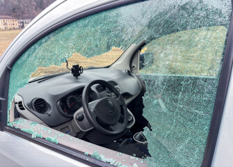 Car window smashed as a result of an act of vandalism