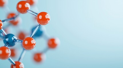 A close-up view of a 3D molecular structure featuring red and blue spheres connected by metallic bonds against a soft blue background.
