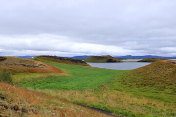 Fototapeta premium Pseudo craters, volcanoes and geothermal areas near Skutustadir at lake Myvatn in Iceland