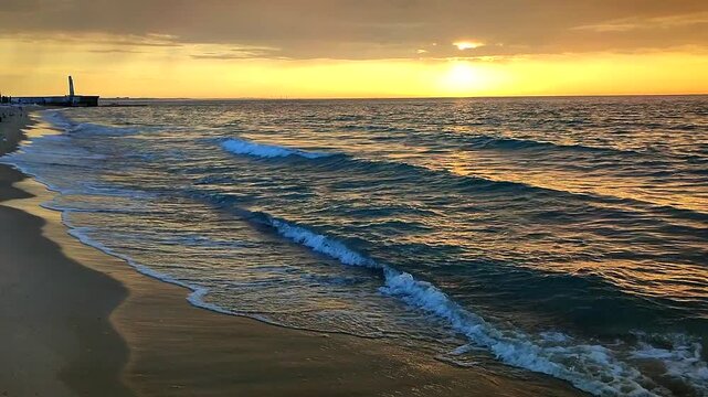 Sunrise or sunset at sea. Rising or setting sun over horizon at sea. Dawn in sky with dark rainy clouds. Sunset with large clouds before rain in sky. Sun path on sea surface. Nature backdrop.