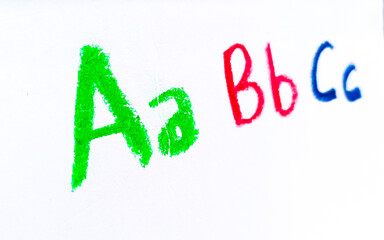 Crayon alphabet isolated over white background, Letters abcd. Colorful hand drawing crayon texture