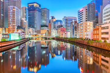 Obraz premium Osaka, Japan FInancial District Skyline on the Ogawa River 2129