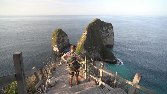 Waves rolling on Manta Bay or Kelingking Beach on Nusa Penida Island, Bali, Indonesia