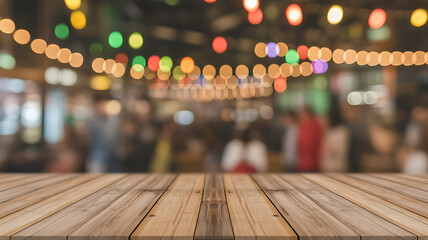 Wooden table surface in front of a blurred background of a lively restaurant with colorful bokeh lights
