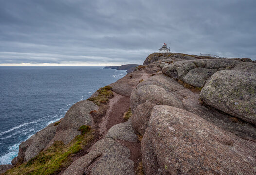 Rocky coast and historic lighthouse at Cape Spear, Newfoundland and Labrador, Canada