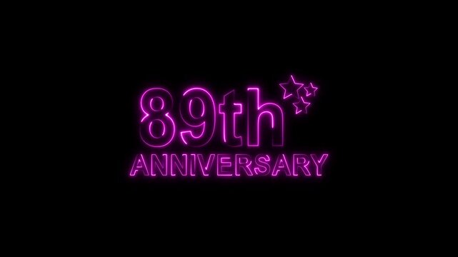 A vibrant purple neon sign illuminates a dark background, proudly displaying 89th anniversary with stylized glowing stars, symbolizing a significant twoyear milestone celebration or event with a moder