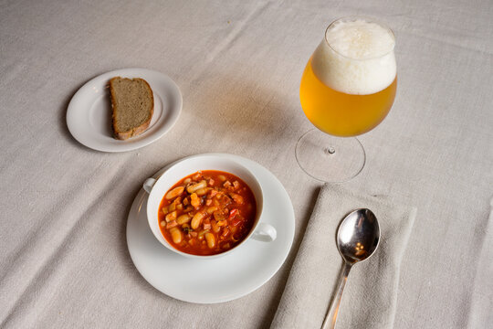 Serbian Bean Soup or Pasulj Stew with Bread and a Beer