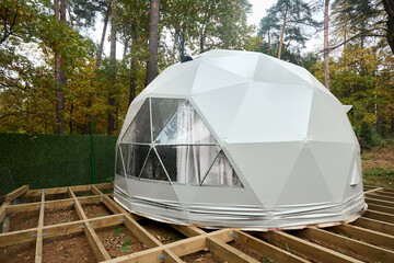 Geodesic domes for glamping and camping, thin-shell structure lattice shell based on geodesic polyhedron. Glamping is glamorous and camping, style of camping with amenities and resort style services.