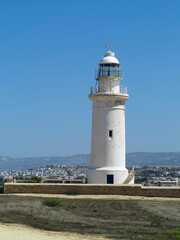 Old white lighthouse near Paphos city Cyprus
