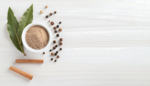 Allspice powder and whole allspice berries overhead