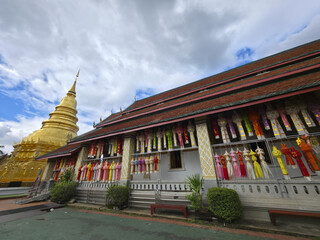Magnificent buddhist temple Thailand showcases stunning traditional architecture. golden stupa...