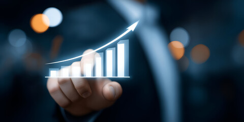 A business professional interacts with a digital graph, symbolizing growth and financial advancement in a modern corporate environment.