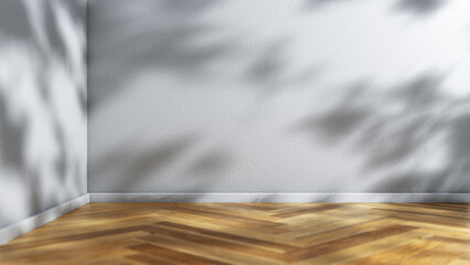 Empty room corner with wooden floor and shadows on the wall