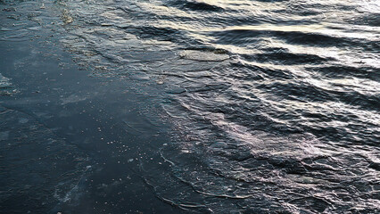 Snow river winter landscape. Frozen ice and snow by river.