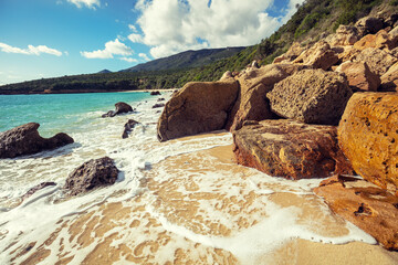 Galapinhos beach on a sunny day. Rocky seascape. Setubal region, Atlantic Ocean, Portugal