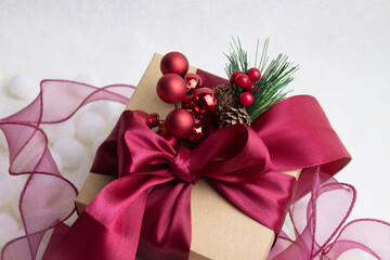 Christmas gift with festive decorations.