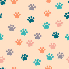 Fototapeta premium Seamless pattern with paw print on peach background for fabric, decor and children's design