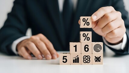 Businessman stacking wooden blocks with numbers and financial icons finance growth