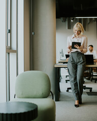 Businesswoman working in a modern office environment during the day