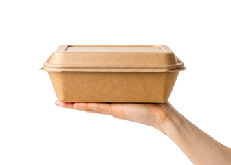 hand holding Closed brown cardboard food container isolated on a transparent background.