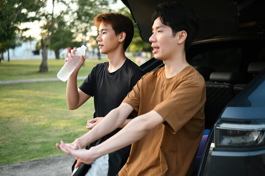 Young Asian LGBT Couple Sharing a Moment Together After Outdoor Exercise - Powered by Adobe