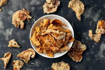 Crispy Fried Mushroom chips, snack in a white bowl