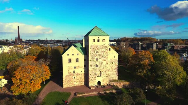 Short Cinematic Drone Clip of Historic Turku Castle Surrounded by Autumn Colors.