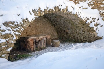 Stary Jicin castle ruins. Seating under the snowy arch in the upper courtyard. Czech Republic. 