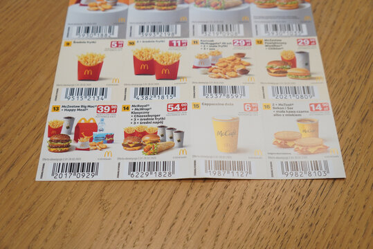 McDonald's Menu with Prices and Food Items on Wooden Table