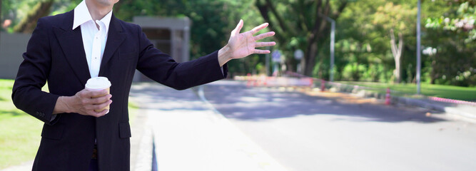 Businessman, wave for cab and taxi in city for transport, morning commute or ride