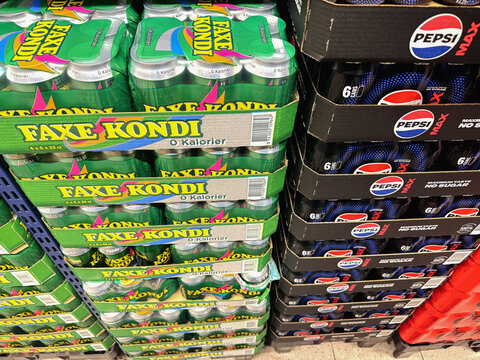 Stacks of Faxe Kondi and Pepsi Cola boxes in store. Copenhagen, Denmark - December 7, 2025