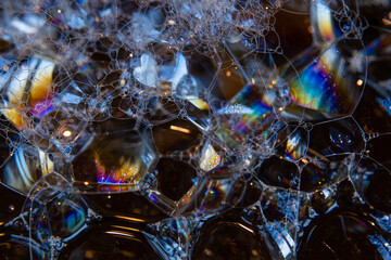 Reflective, prismatic, geometric soap bubbles. Background. 