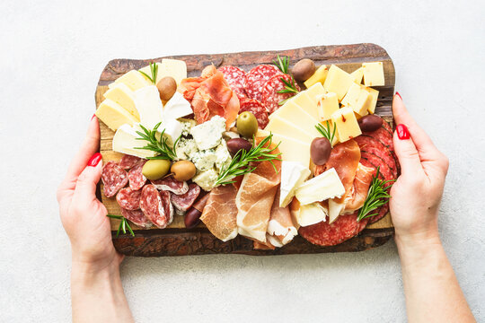 Antipasto platter with jamon, salami and cheese assortment. - Powered by Adobe