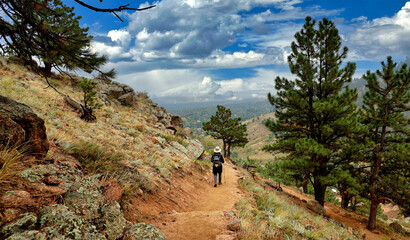 Hiker on Boulder, Colorado's Anemone Trail © Jim Glab