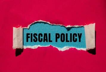 Fiscal Policy message written on ripped torn paper background. Conceptual Fiscal Policy symbol. Copy space.