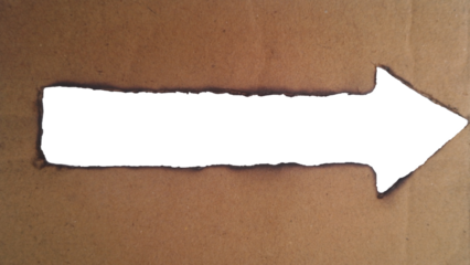 Rough textured burnt cardboard with arrow cutout pointing right isolated on transparent background