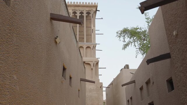 Low Angle View of Traditional Wind Towers and Heritage Architecture