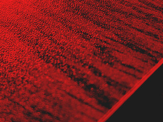 Red background featuring soft wooden texture