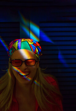 Young woman in colorful headscarf and vibrant ambiance