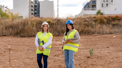 Architect and engineer on construction site