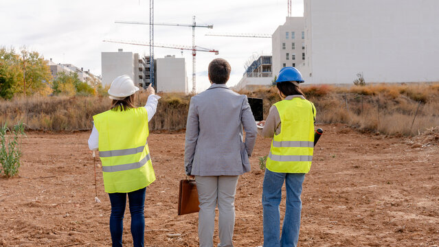 Architect, engineer and investor at a construction site