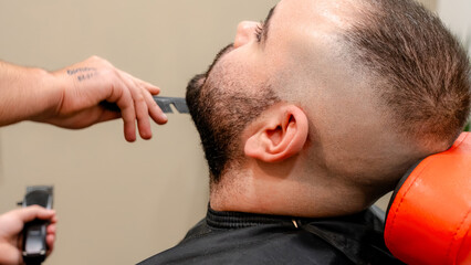 Close-up of a beard trim in a professional barbershop
