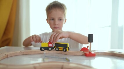 Child play with toy train enhances learning through play. Education fun as kid guides colorful train. playtime supports child development. Train play fosters imagination and early education skills.