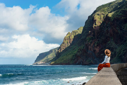 Woman enjoying scenic view in Jardin do Mar