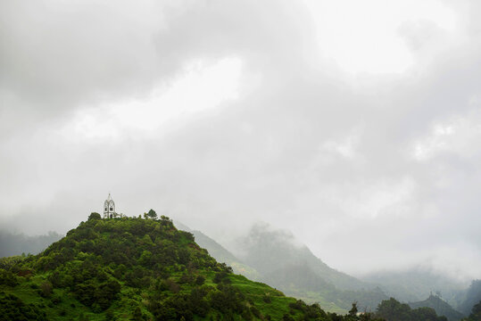 Scenic view of chapel amid Madeira lush landscape