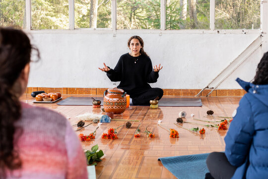 Meditation teacher at a mindfulness retreat session