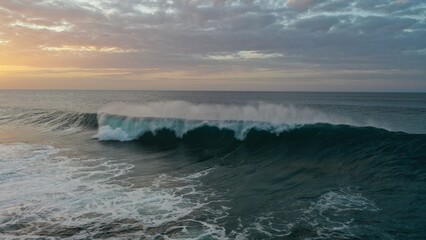 I watch the waves and contemplate the sunset by the sea